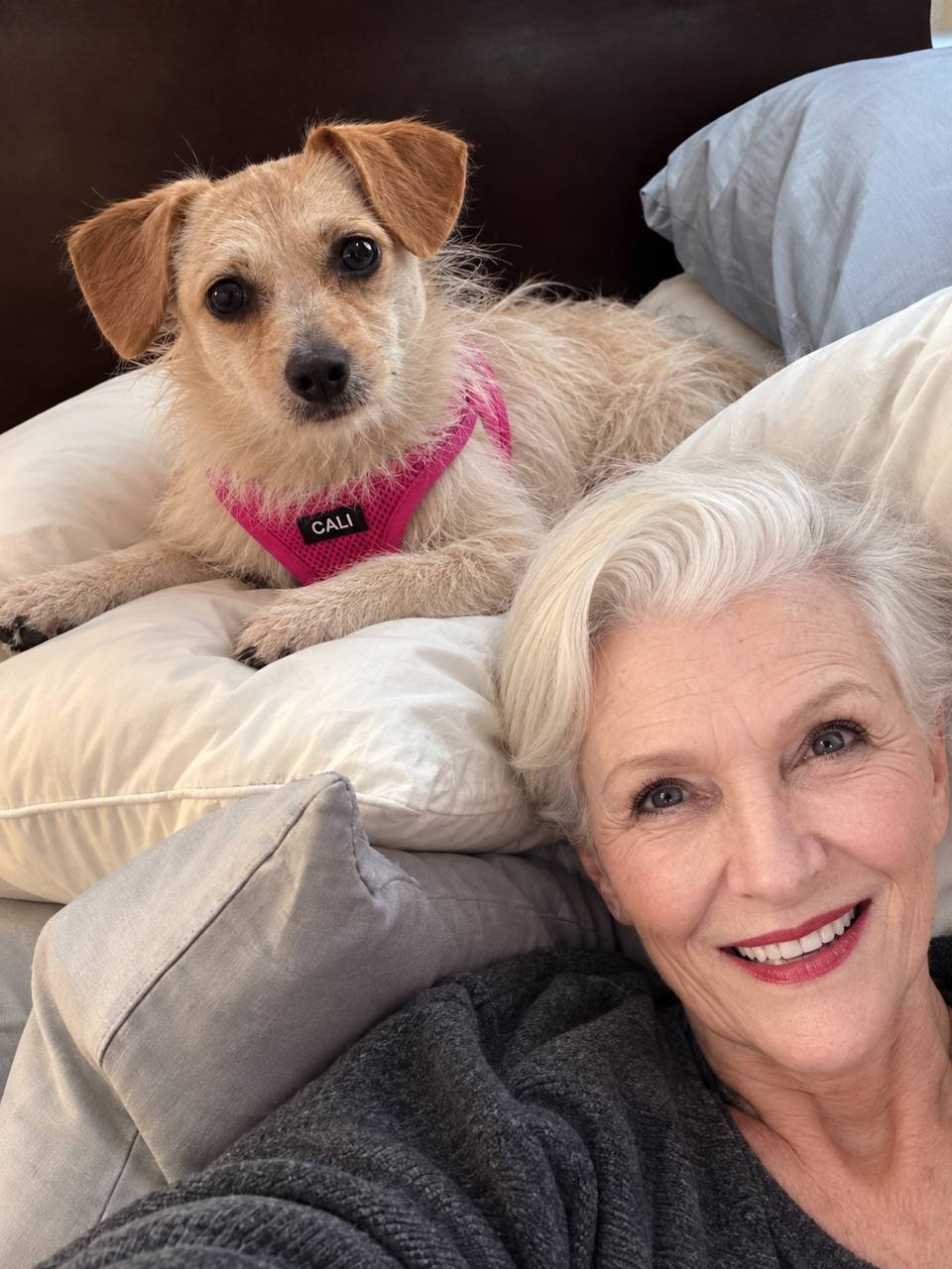 Selfie of Maye Musk with Cali on cushions